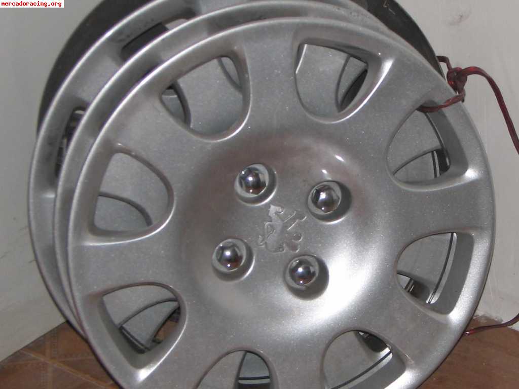 4 Tapacubos Peugeot originales